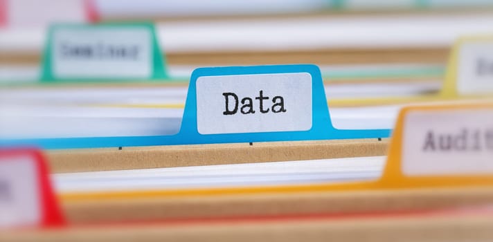 File folders with a tab labeled Data