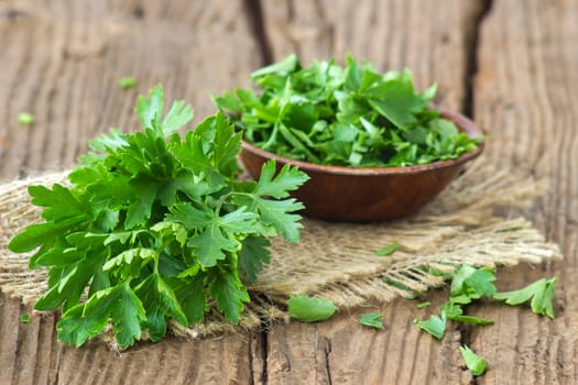 fresh parsley on wooden background