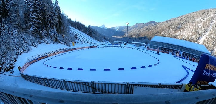 View from the Chiemgau Arena to the penalty lap,behind it are the Zirmbergschanzen of Ruhpolding - IBU Biathlon World Cup Sprint Women Ruhpolding 2022...