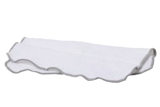 Household cleanliness and hygiene. Close-up of a white cleaning cloth isolated on a white background. Microfiber cleaning cloth. Macro.