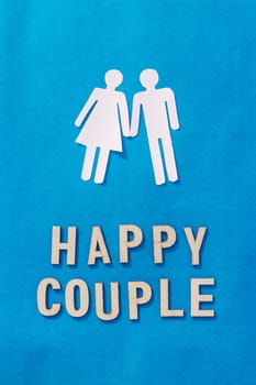 Happy Human Couple Paper Craft Mockup on Blue background. Origami Papercraft decorative shapes and figures.