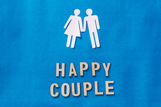 Happy Human Couple Paper Craft Mockup on Blue background. Origami Papercraft decorative shapes and figures. Vertical.