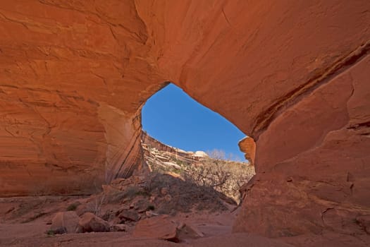 Peeking Through a Window in the Desert at Kachina Bridge in Natural Bridges National Monument in Utah