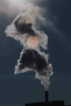 Air pollution from power plant chimneys. Industry and global warming concept