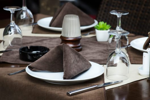 Restaurant table served for dinner