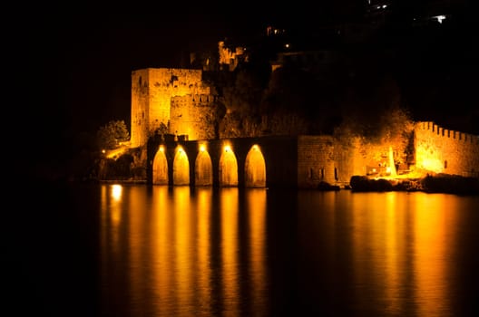 Antique fortress at night in Alanya, Turkey