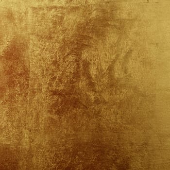 Shiny textured background painted in gold