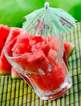 Watermelon juice on green background