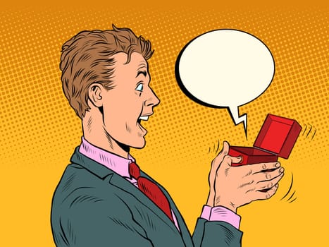 The male businessman is surprised box valentine surprise greeting, love romance. Pop Art Retro Vector Illustration 50s 60s Vintage kitsch Style