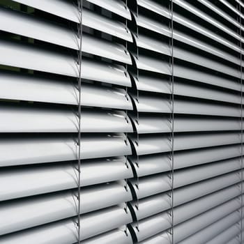 Blinds as sun protection on the window of an office building in Berlin in Germany