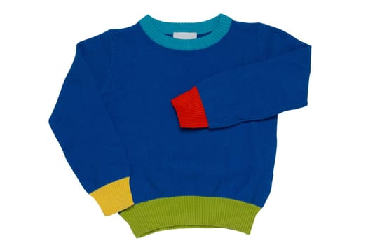 Top view of clothes for child boy isolated on a white background. A beautiful blue little child sweater or knitted cardigan. Autumn and winter fashion for kids.