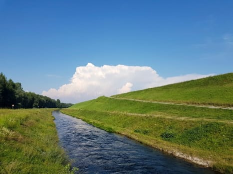 Canal near the accumulation lake of the Hydroelectric Power Plant Donja Dubrava. There are a lot of trout in it The faster and clearer channel is a place for trout fishing enthusiasts. It is 15 km long and ends in the power plant.