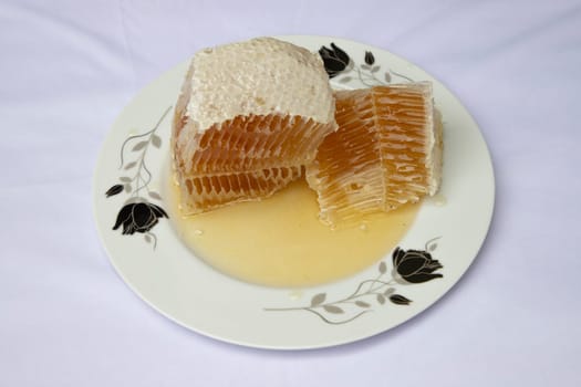 Pure Honey in the Plate. Original Organic Natural honey