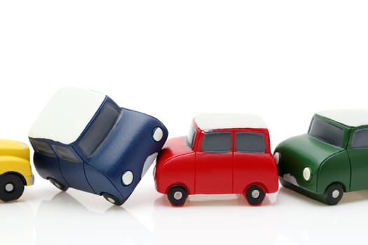 Small toy car, Crash accident image on isolated white background.