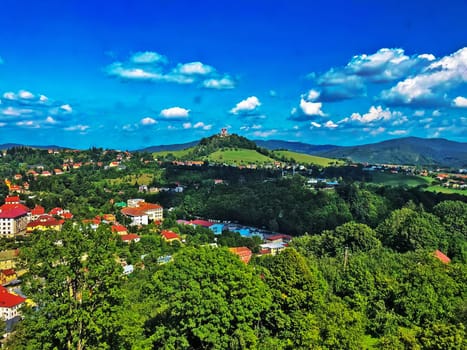 View of Banska Stiavnica with church on the Hill in Slovakia