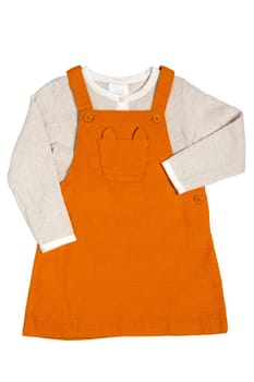 Summer dress isolated. Closeup of a beautiful orange baby girl dress and a beige shirt with isolated on a white background. Clipping path. Children spring fashion.
