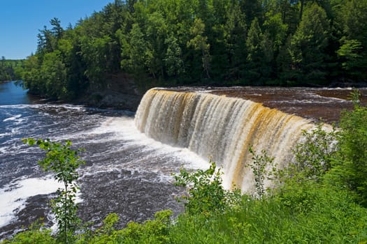 Roaring Upper Tahquamenon Falls on a Sunny Day in Upper Michigan