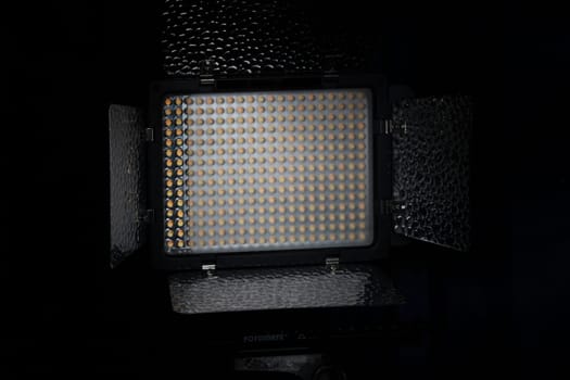led spotlight with reflectors on black background