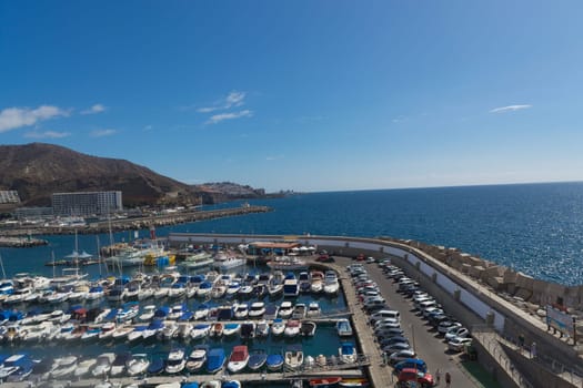 Cran Canaria, Puerto Rico, Spain - November 16, 2019:.Marina in Puerto Rico de Gran Canaria. Postcard, spain.