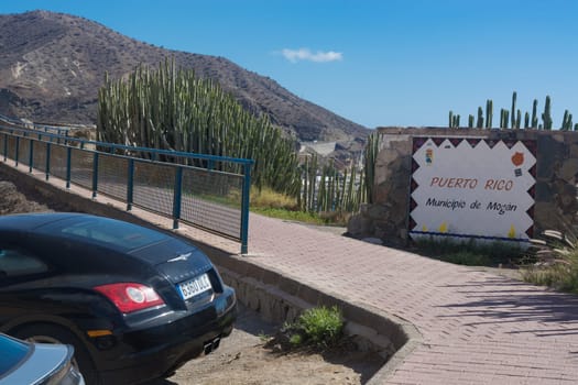 Cran Canaria, Puerto Rico, Spain - November 16, 2019:.Chrysler Crossfire Coupe in a parking lot above the marina in Puerto Rico on Gran Canaria.