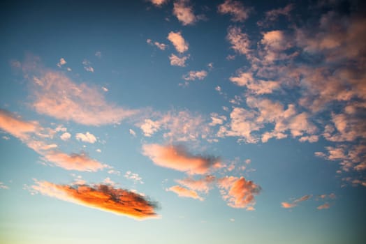 orange clouds at blue sky