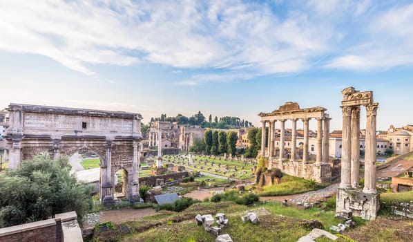 ROME, ITALY - CIRCA AUGUST 2020: sunrise light with blue sky on Roman ancient architecture.