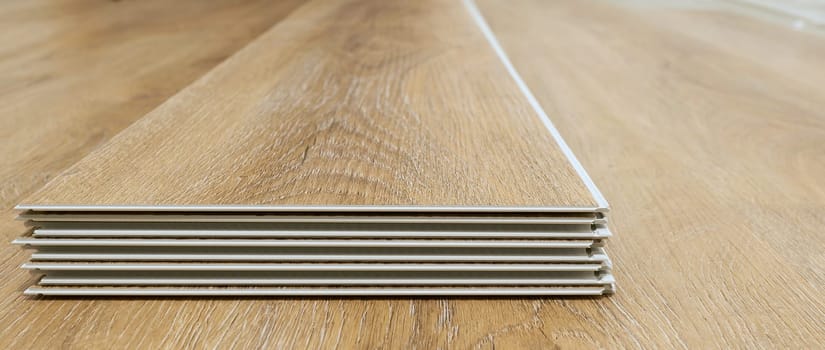 Click vinyl flooring to install yourself in the living room of an apartment