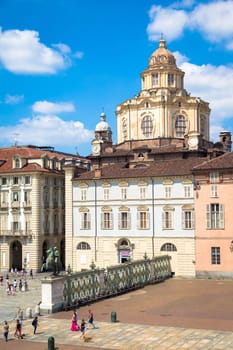 TURIN, ITALY - CIRCA AUGUST 2020: perspective on the elegant and Baroque Saint Lawrence church in Turin. Amazing natural light with a blue sky.