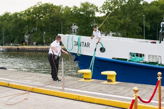 Mooring of the passenger ship Jantar in the port of Kolobrzeg on the Polish Baltic coast