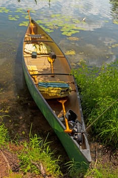 Canoe Waiting on Shore for Adventure on Crooked Lake in the Sylvania Wilderness in Michigan