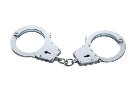 Metal handcuffs on a white isolated background. High quality photo