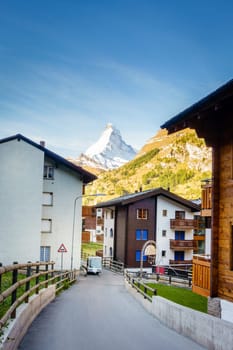 A street in the Swiss resort town of Zermat with a view of Matterhorn
