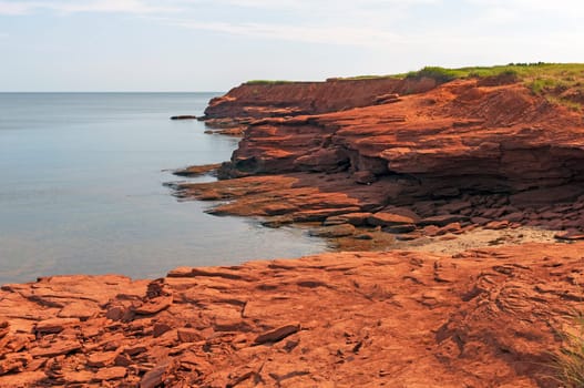 Red Sandstone Cliffs at Low Tide on Cavendish Beach at Prince Edward Island National Park in Canada