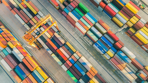 Aerial view of shipping container port terminal. Colourful pattern of containers in harbor. Maritime logistics global inport export trade transportation