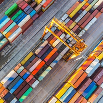 Aerial view of shipping container port terminal. Colourful pattern of containers in harbor. Maritime logistics global inport export trade transportation