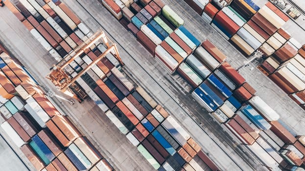 Aerial view of shipping container port terminal. Colourful pattern of containers in harbor. Maritime logistics global inport export trade transportation