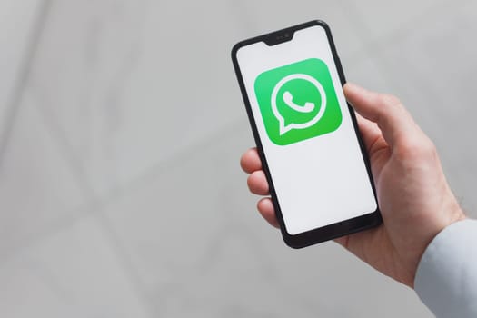 Minsk, Belarus - january 13, 2022: whatsapp application on the screen on of smartphone
