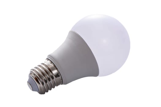 A white LED lamp with an E27 base lies on a white insulated background. High quality photo
