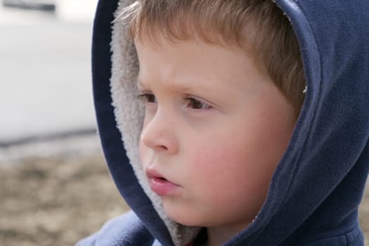 a portrait of young child, outdoor