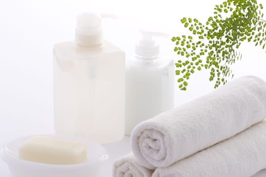 Hand-made soap and sea salt  on grey bamboo mat