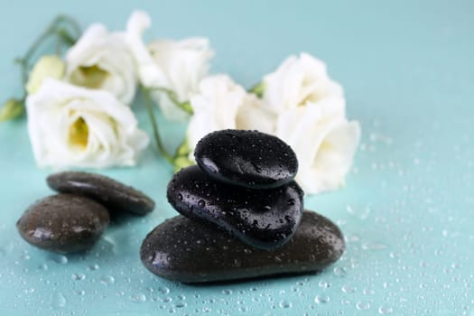 Hand-made soap and sea salt  on grey bamboo mat