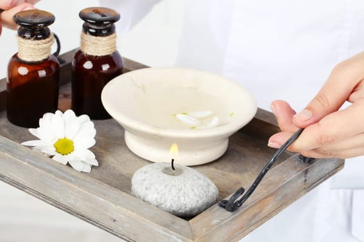 Hand-made soap and sea salt  on grey bamboo mat