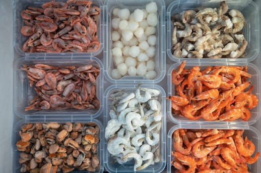 Frozen Seafood in fridge at the fish market. Healthy eating and fish market concept