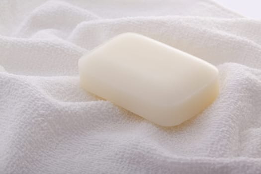 Hand-made soap and sea salt  on grey bamboo mat