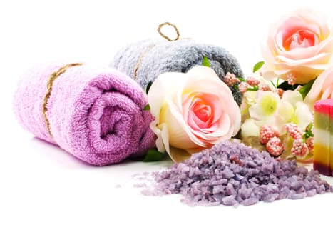 Hand-made soap and sea salt  on grey bamboo mat