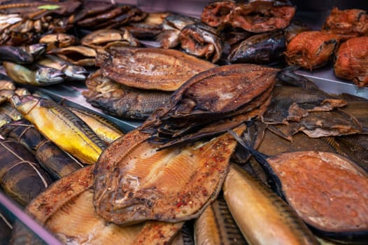 Various smoked fish products. Healthy eating and fish market concept