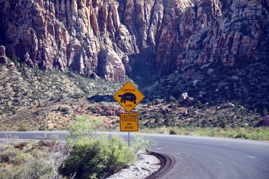 Caution, Turtles xing on the road sign in the Red Rock Canyon in Nevada