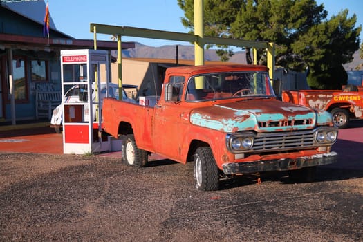 Traditional red truck on the route 66 in Arizona in the West Coast of the United States of America
