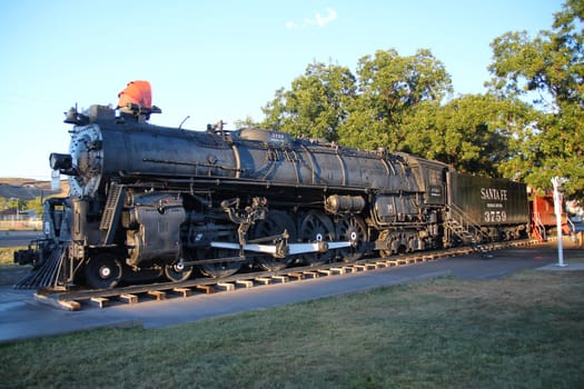 The black steam locomotive on the Route 66 at Kingman in Arizona