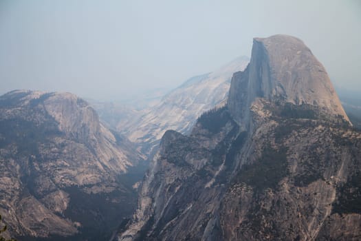 The Yosemite National Park Half Dome with the ash of the 2017 wild fire in California